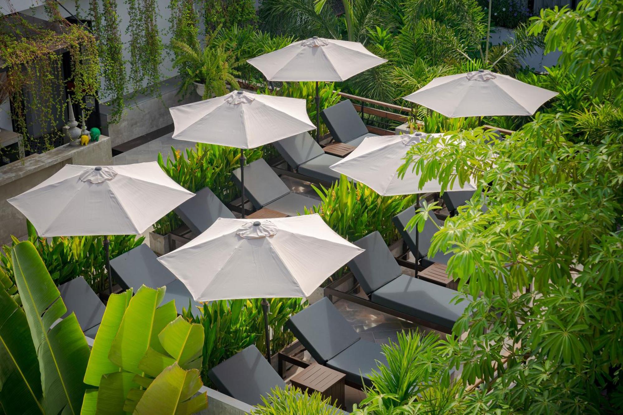 Eightfold Urban Resort Siem Reap Exterior photo The pool at the hotel